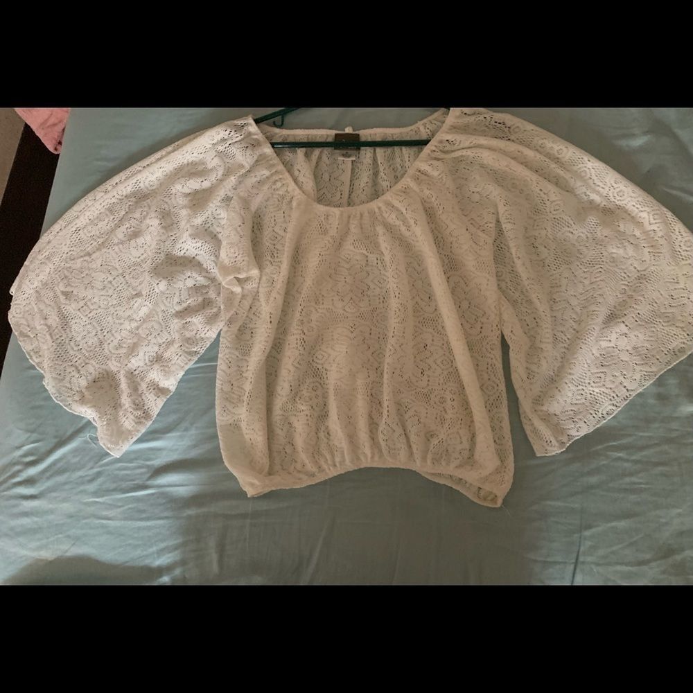 Lace off white top. Butterfly sleeves.